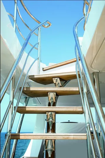 Miss M Yacht Photos Pics Staircase on Azimut Grande 35 Metri yacht, 2020 model, with sleek metal railings.