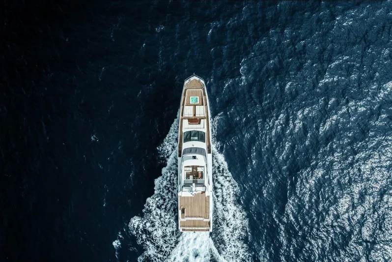 Miss M Yacht Photos Pics Aerial view of 2020 Azimut Grande 35 Metri yacht cruising on open sea.