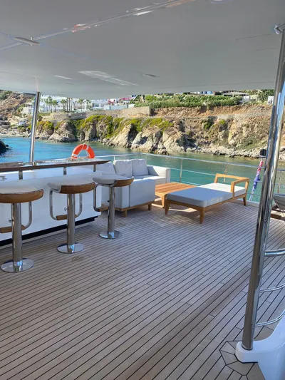 Miss M Yacht Photos Pics Luxury yacht deck with bar stools and seating, Azimut Grande 35 Metri, 2020 model.