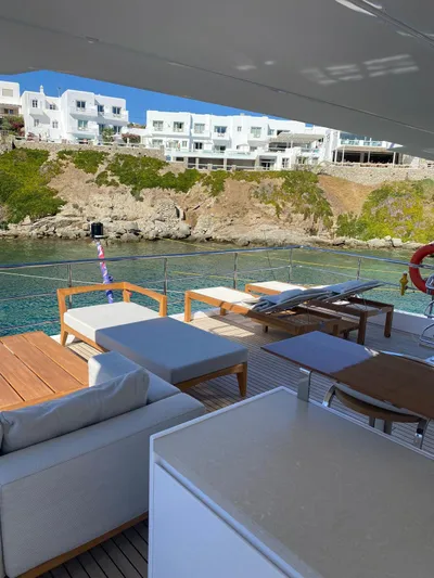 Miss M Yacht Photos Pics Luxury Azimut Grande 35 Metri yacht deck with coastal view, 2020 model.