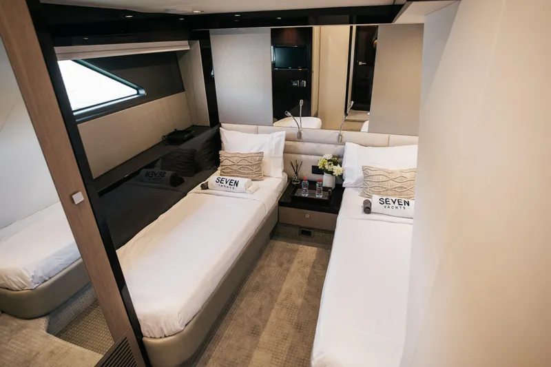 My Serenity Yacht Photos Pics Luxurious twin cabin interior of 2018 Sunseeker Manhattan 66 yacht.