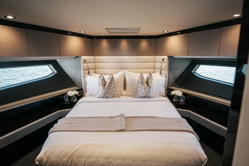 My Serenity Yacht Photos Pics Luxurious bedroom interior of 2018 Sunseeker Manhattan 66 yacht with elegant decor.