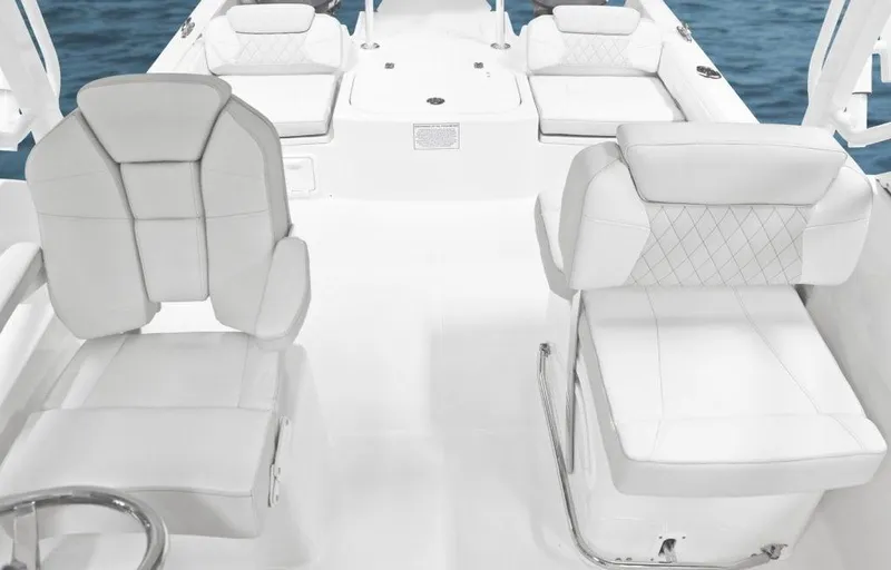 51980 230dc Nap Yacht Photos Pics Manufacturer Provided Image: 2025 World Cat 230 DC boat interior with white seating and modern design.