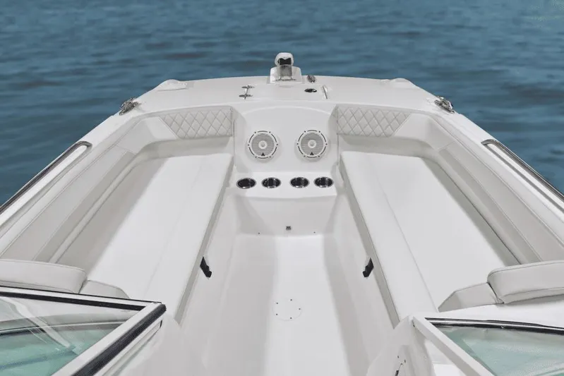 51980 230dc Nap Yacht Photos Pics Manufacturer Provided Image: 2025 World Cat 230 DC boat interior with seating, speakers, and ocean view.