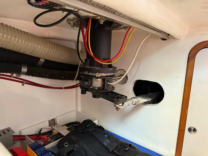 Aevitas Yacht Photos Pics Engine compartment of 2011 Outbound 46 sailboat, showing mechanical components and wiring.