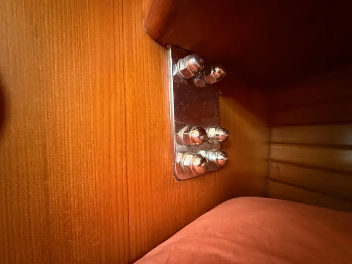 Aevitas Yacht Photos Pics Stainless steel bolts on wooden interior of 2011 Outbound 46 yacht.