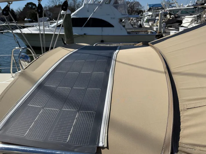 Aevitas Yacht Photos Pics Solar panel on 2011 Outbound 46 yacht, docked at marina.