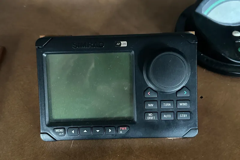 Apple 1 Yacht Photos Pics Simrad AP28 autopilot control on 1974 Hatteras 58 Yachtfish.