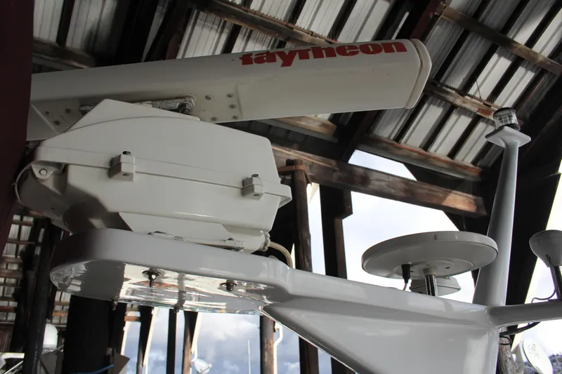 Apple 1 Yacht Photos Pics Radar equipment on a 1974 Hatteras 58 Yachtfish under a metal roof.