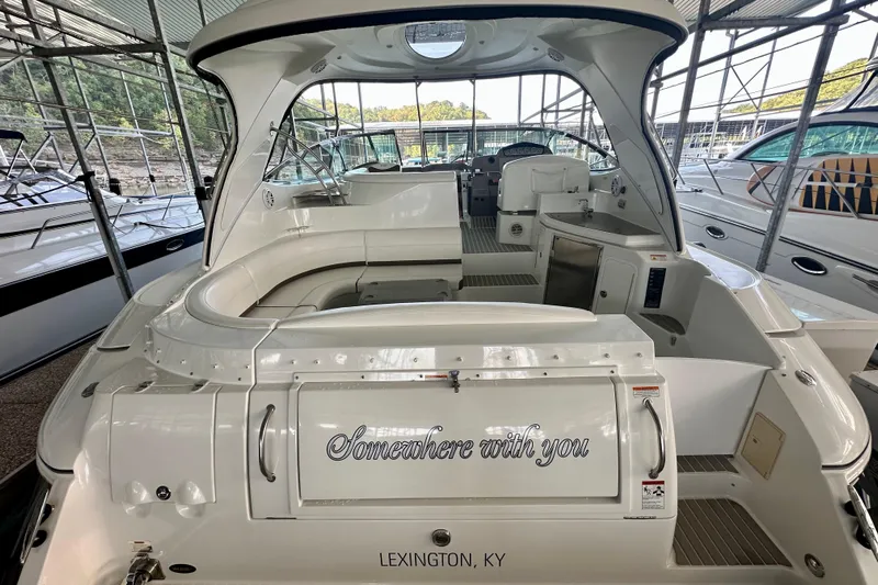 Somewhere With You Yacht Photos Pics 2009 Cruisers Yachts 460 Express in marina, Lexington, KY, with "Somewhere with you" text.