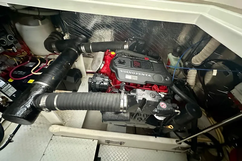 Somewhere With You Yacht Photos Pics Engine room of 2009 Cruisers Yachts 460 Express with Volvo Penta engine.