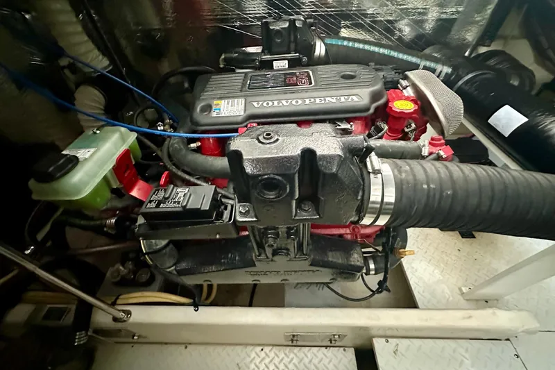 Somewhere With You Yacht Photos Pics Engine compartment of 2009 Cruisers Yachts 460 Express with Volvo Penta engine.