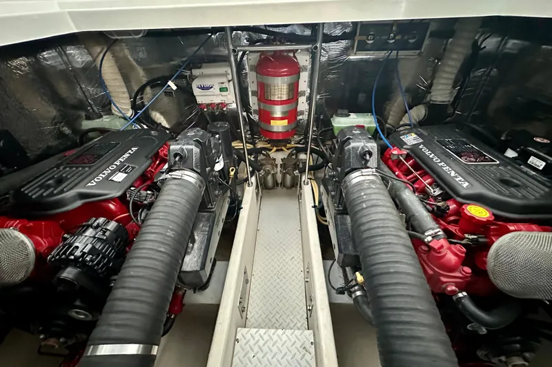 Somewhere With You Yacht Photos Pics Engine room of 2009 Cruisers Yachts 460 Express with Volvo Penta engines.