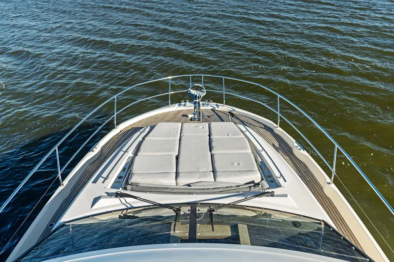 Pure De Papas Yacht Photos Pics Prestige 520 Fly 2019 yacht bow view on open water.