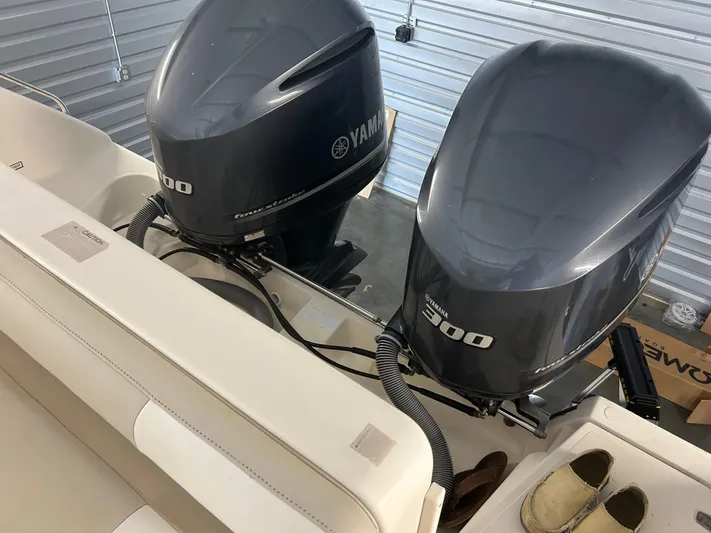  Yacht Photos Pics 2012 Pursuit OS 315 Offshore with dual Yamaha 300 outboard engines in storage.