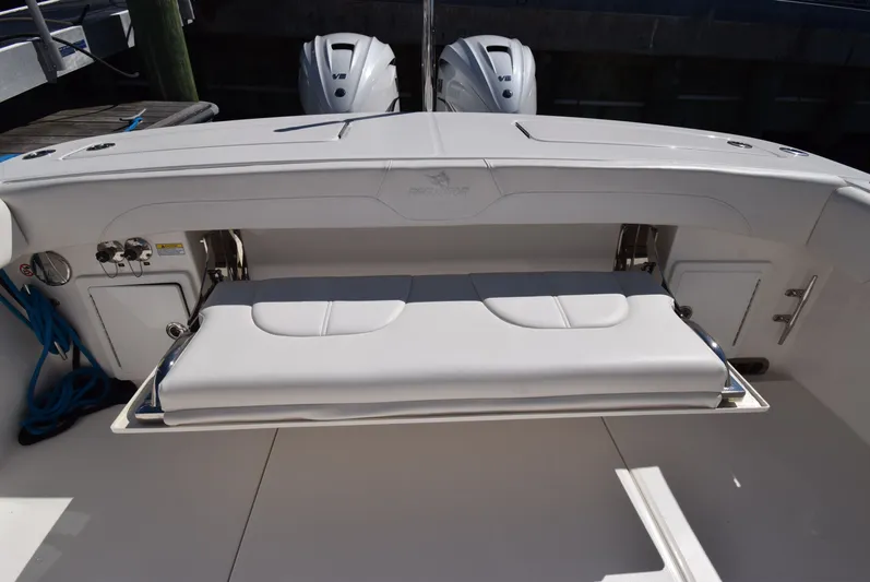 Salty Dog Yacht Photos Pics 2023 Regulator 31 boat with foldable seating and dual outboard engines.