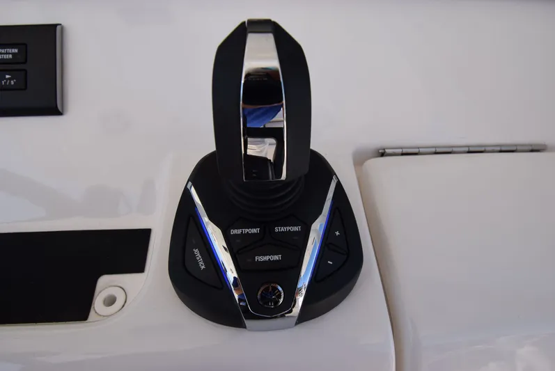 Salty Dog Yacht Photos Pics 2023 Regulator 31 boat control panel with joystick and function buttons.