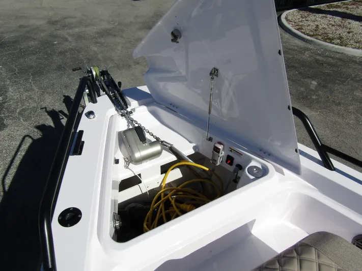  Yacht Photos Pics Open storage compartment of 2025 Axopar 37XC CROSS CABIN boat with equipment.