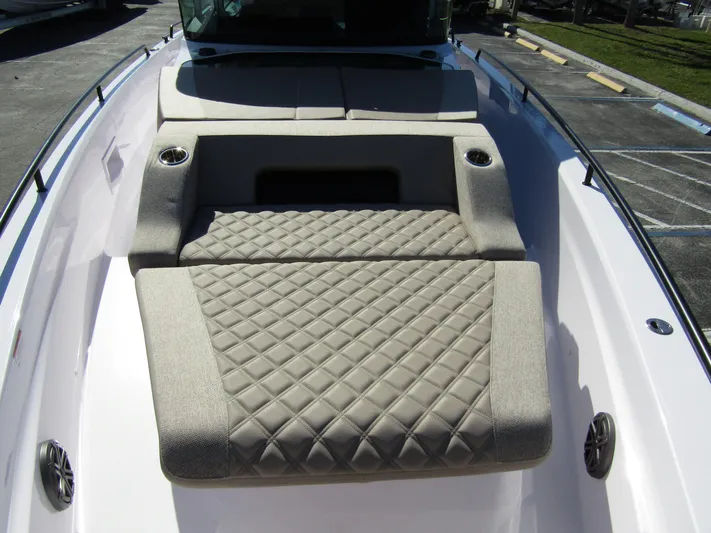  Yacht Photos Pics 2025 Axopar 37XC CROSS CABIN boat with quilted seating on deck.