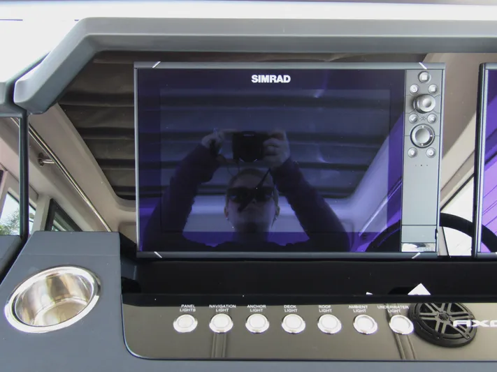  Yacht Photos Pics Simrad display on 2025 Axopar 37XC CROSS CABIN boat dashboard.