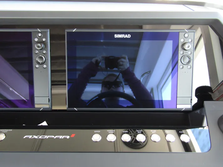  Yacht Photos Pics Simrad navigation system on 2025 Axopar 37XC CROSS CABIN dashboard.