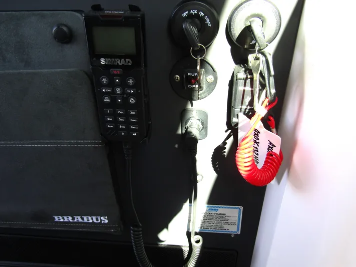  Yacht Photos Pics Control panel of 2025 Axopar 37XC CROSS CABIN with Simrad radio and Brabus branding.