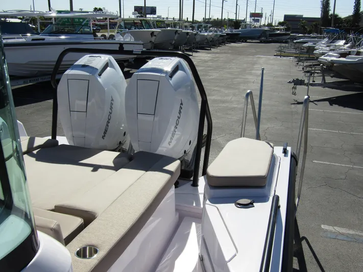  Yacht Photos Pics 2025 Axopar 37XC CROSS CABIN with dual Mercury engines in a boatyard.