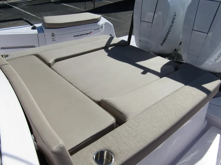  Yacht Photos Pics 2025 Axopar 37XC CROSS CABIN boat with cushioned seating and Mercury engines.