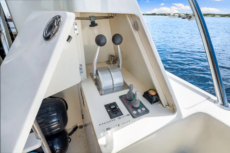 Gypsy Spirit Yacht Photos Pics Control panel of a 2007 Hampton 558 Pilothouse yacht with scenic water view.