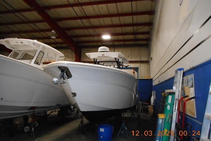  Yacht Photos Pics 2023 Sea Fox 288 Commander boat in indoor storage facility.