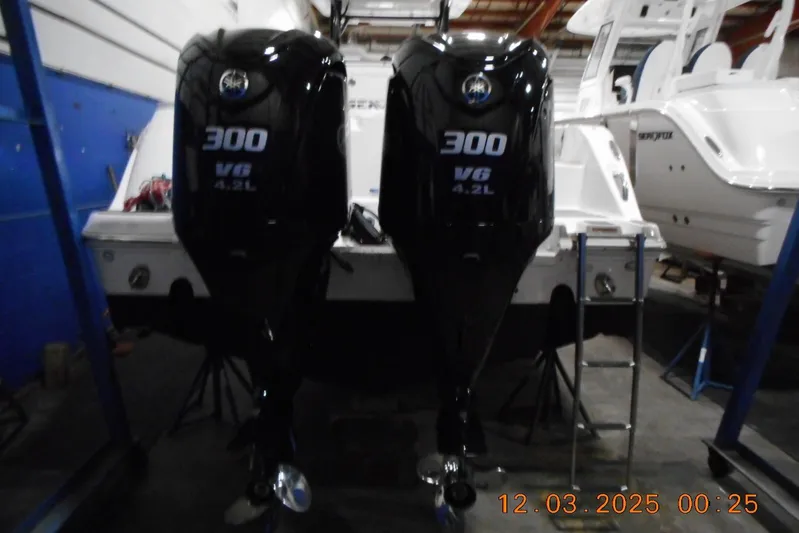  Yacht Photos Pics 2023 Sea Fox 288 Commander with twin 300 V6 4.2L engines in a workshop.