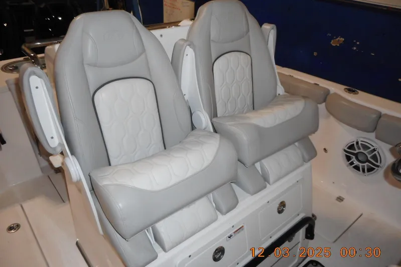  Yacht Photos Pics 2023 Sea Fox 288 Commander boat seats with gray and white upholstery.