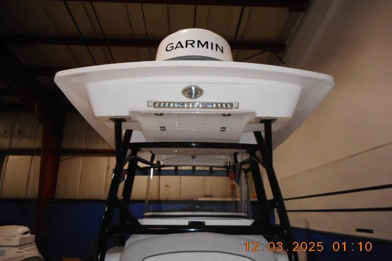  Yacht Photos Pics 2023 Sea Fox 288 Commander boat with Garmin equipment in a warehouse setting.