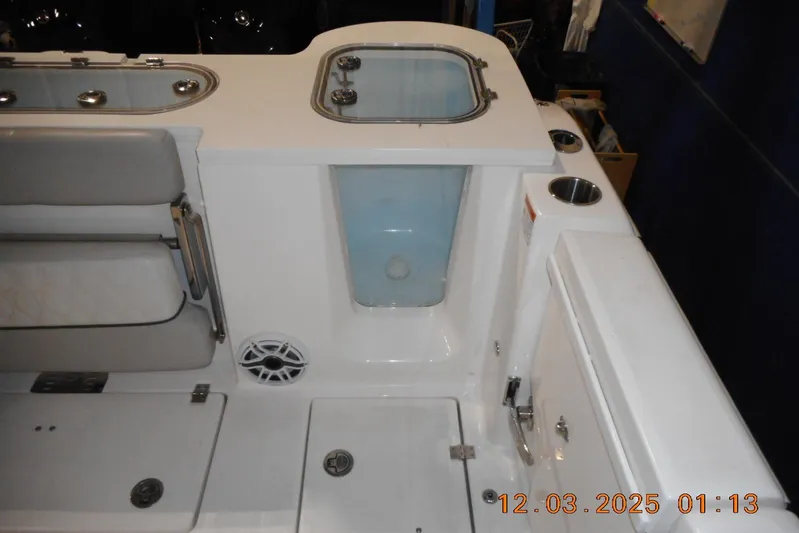  Yacht Photos Pics 2023 Sea Fox 288 Commander boat interior with seating and storage compartments.