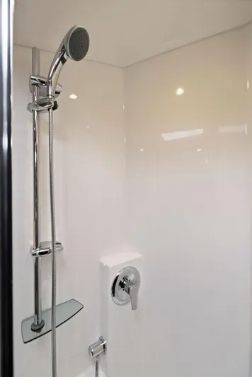 Lil Fella Yacht Photos Pics Modern shower in 2012 Cabo 44 Hardtop Express yacht.