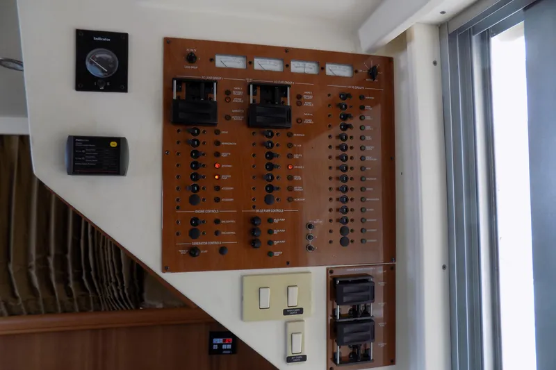  Yacht Photos Pics Electrical control panel on a 2004 Mainship 390 Trawler boat interior.