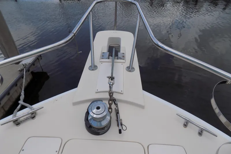  Yacht Photos Pics Bow of 2004 Mainship 390 Trawler with anchor and winch system.