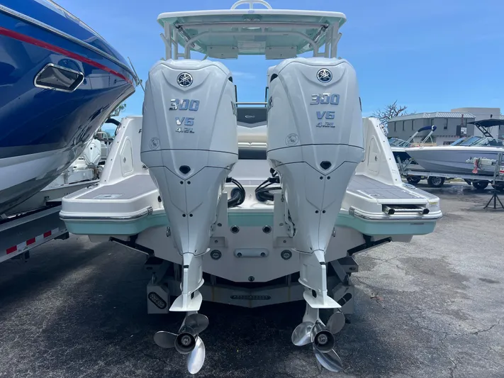  Yacht Photos Pics 2020 Robalo R317 Dual Console with twin 300 V6 outboard engines, rear view.