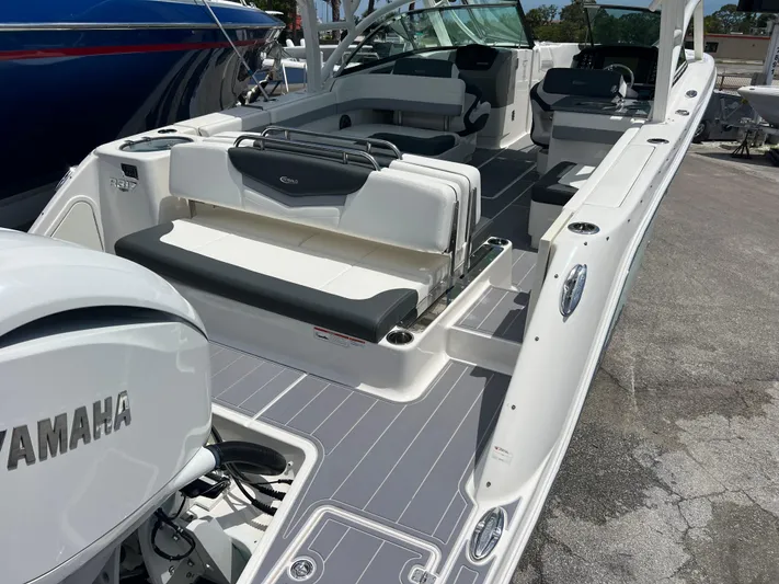  Yacht Photos Pics 2020 Robalo R317 Dual Console boat with Yamaha engine, featuring spacious seating and sleek design.