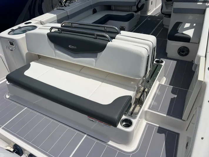  Yacht Photos Pics 2020 Robalo R317 Dual Console boat interior with seating and cup holders.