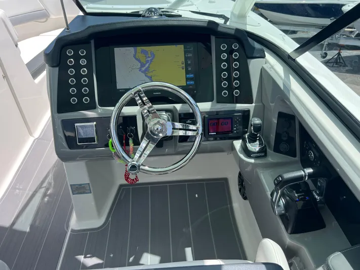  Yacht Photos Pics 2020 Robalo R317 Dual Console helm with navigation display and controls.