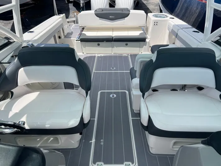  Yacht Photos Pics 2020 Robalo R317 Dual Console boat interior with white and gray seating.