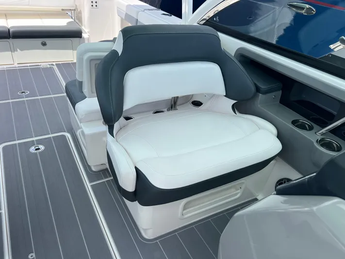  Yacht Photos Pics 2020 Robalo R317 Dual Console boat interior with cushioned seating and modern design.