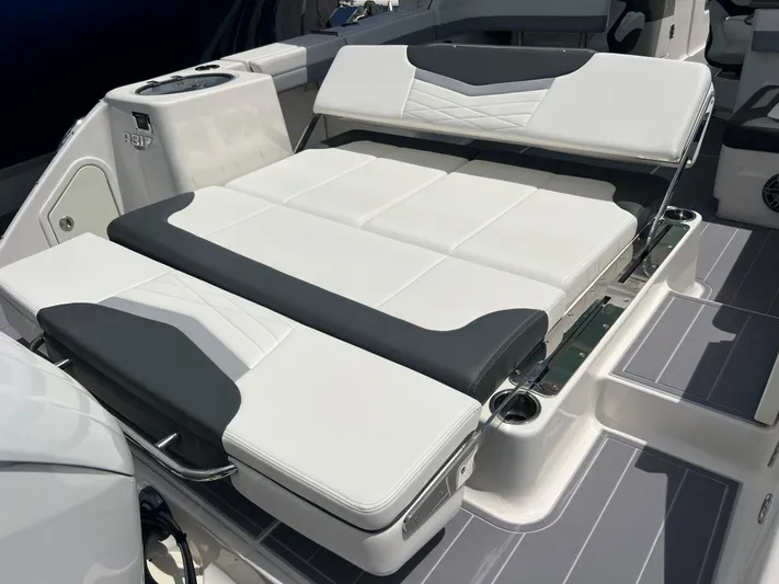  Yacht Photos Pics 2020 Robalo R317 Dual Console boat with luxurious white seating and sleek design.