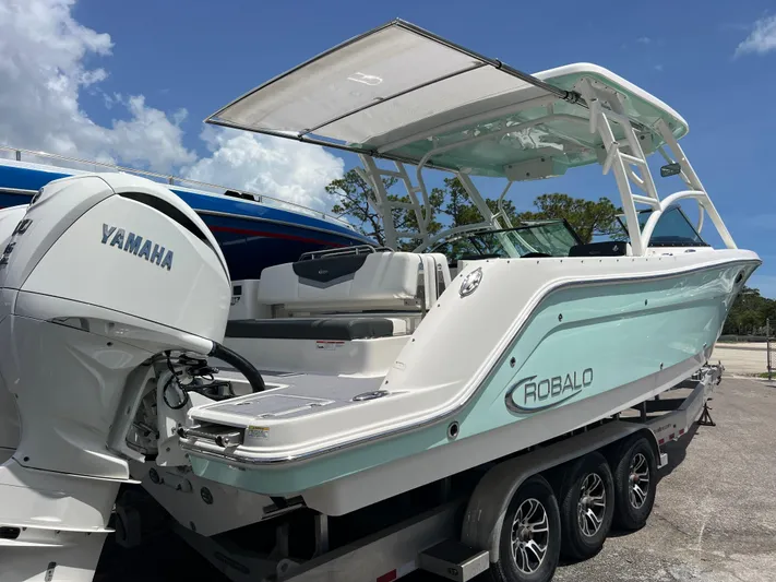 Yacht Photos Pics 2020 Robalo R317 Dual Console boat with Yamaha engine on trailer.