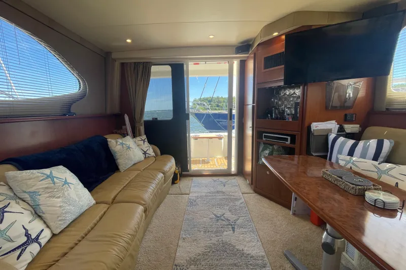 Born Free Yacht Photos Pics Interior of 2007 Silverton 38 Convertible yacht with cozy seating and elegant decor.