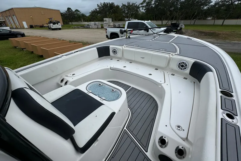  Yacht Photos Pics 2023 Tidewater 2700 Carolina Bay boat interior with seating and storage compartments.