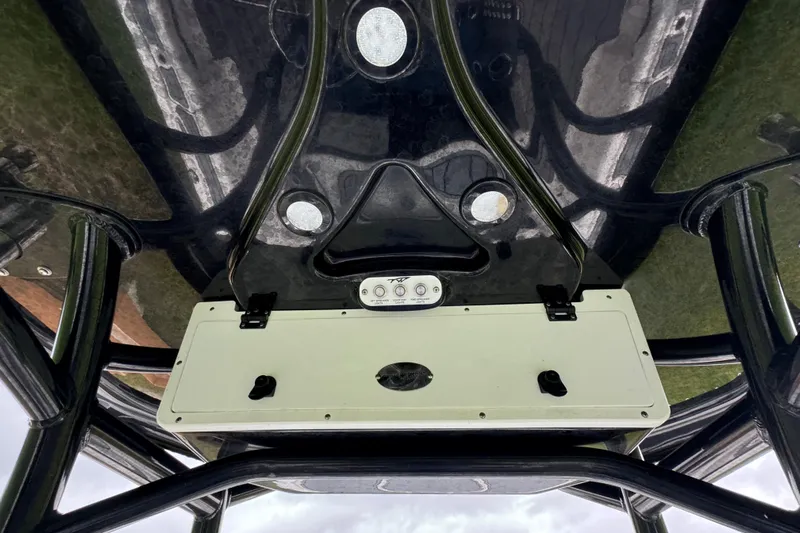  Yacht Photos Pics Tidewater 2700 Carolina Bay 2023 boat console with overhead view and control panel.