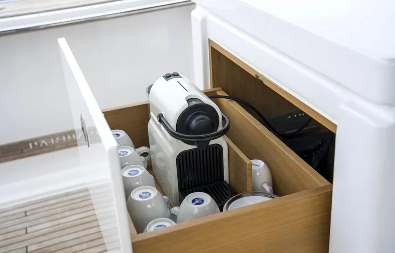  Yacht Photos Pics Coffee machine and cups in a wooden drawer on a 2024 Pardo Yachts P50.