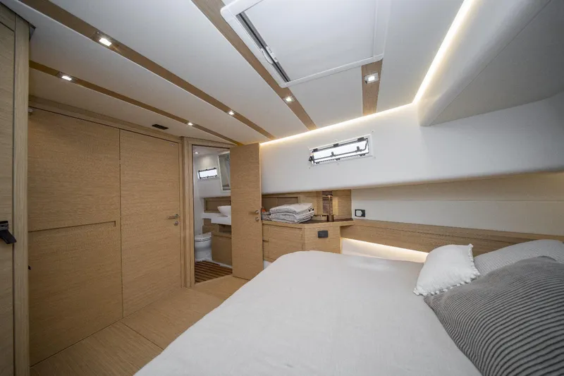  Yacht Photos Pics Luxurious interior of 2024 Pardo Yachts P50, featuring modern design and cozy bedroom.